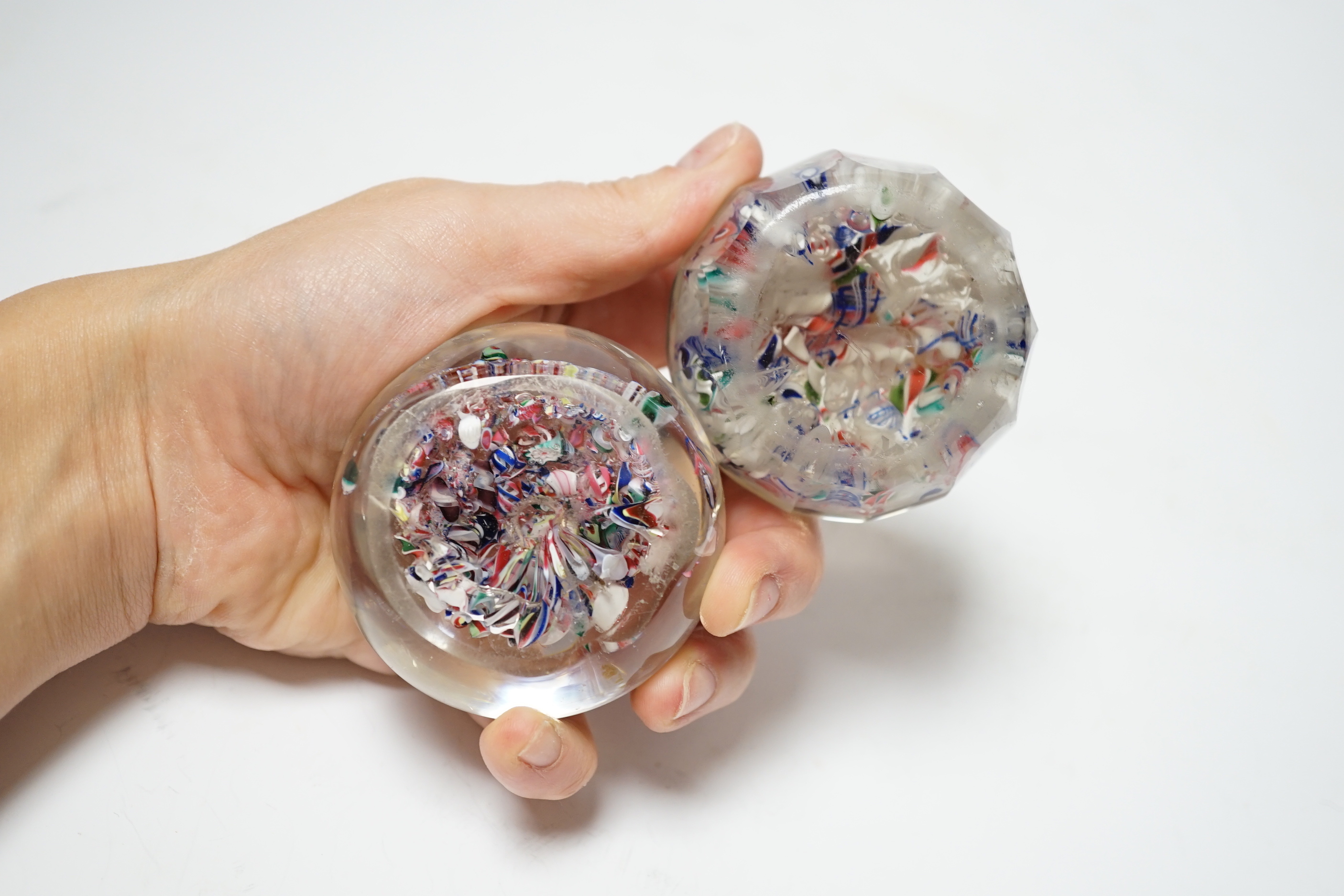 Two French ‘scrambled’ glass paperweights, 6cm diameter